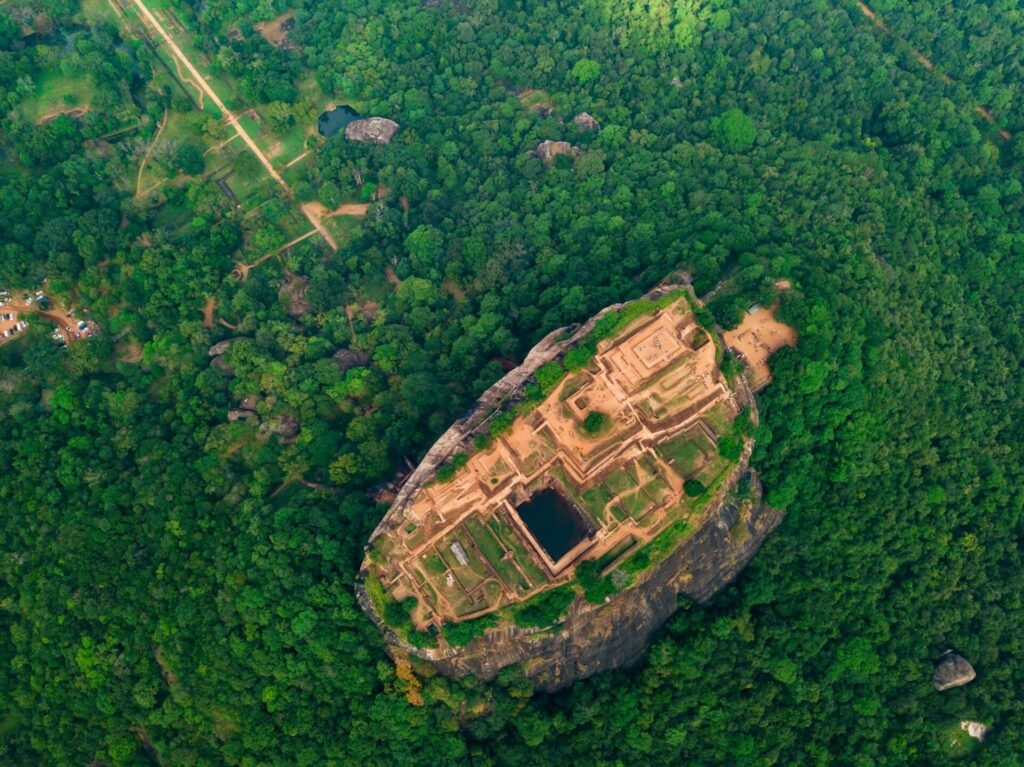 Aerial view of Sigiriya rock at misty morning, Sri Lanka. Drone footage